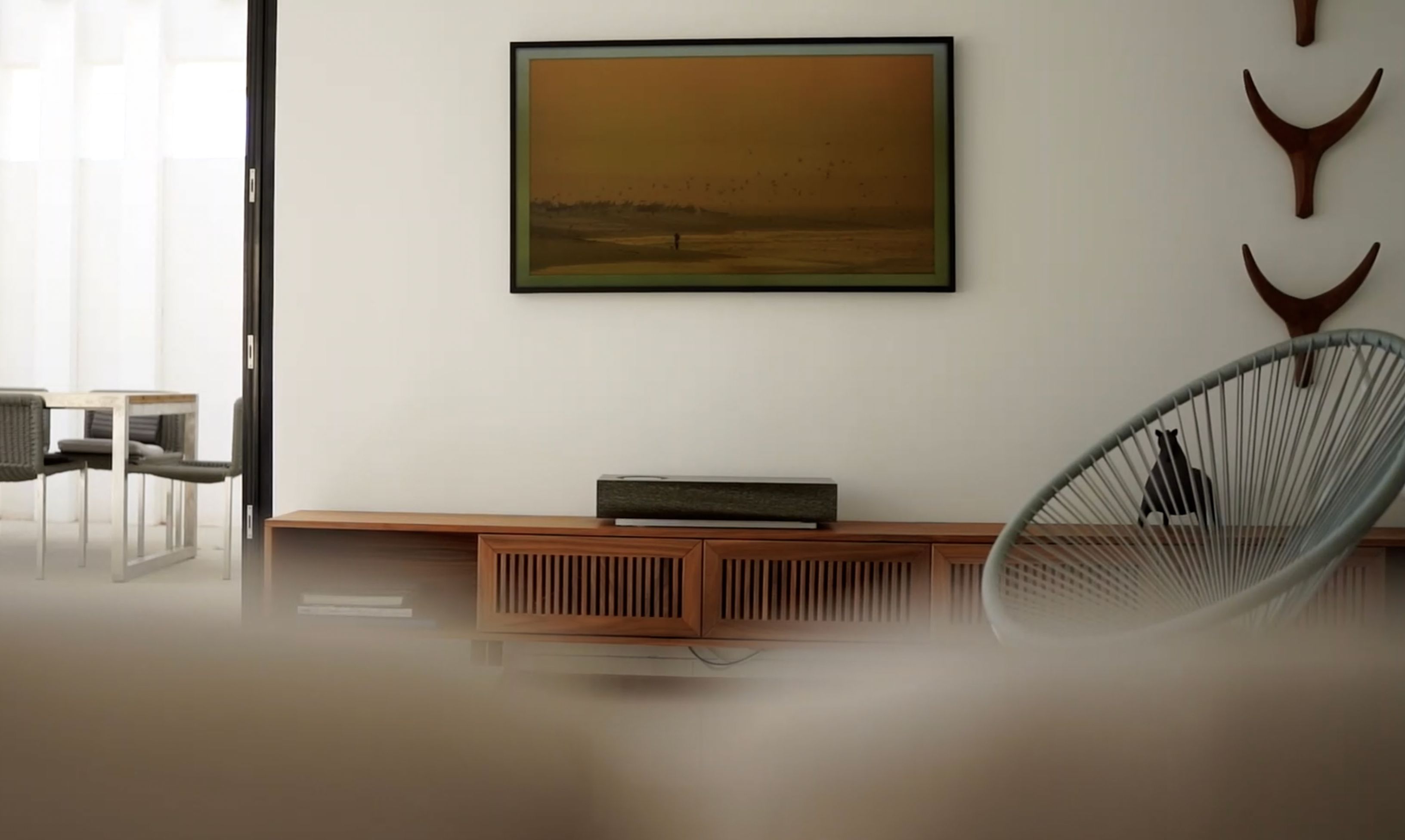 Naim mu-so has room correction to compensate for being positioned close to a wall.