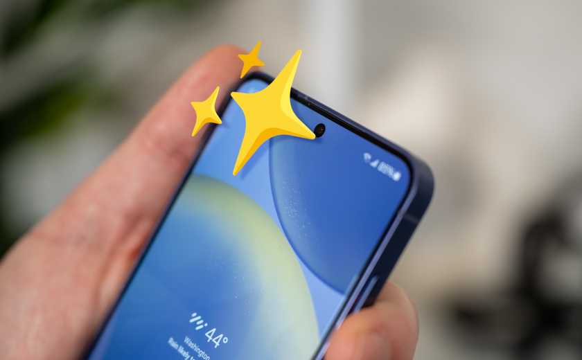 Phone screen with sparkle emoji.