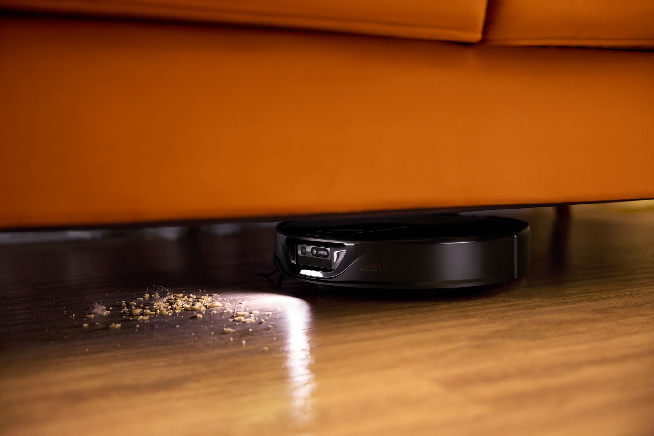 Roborock Qrevo Slim Cleaning Under a Sofa