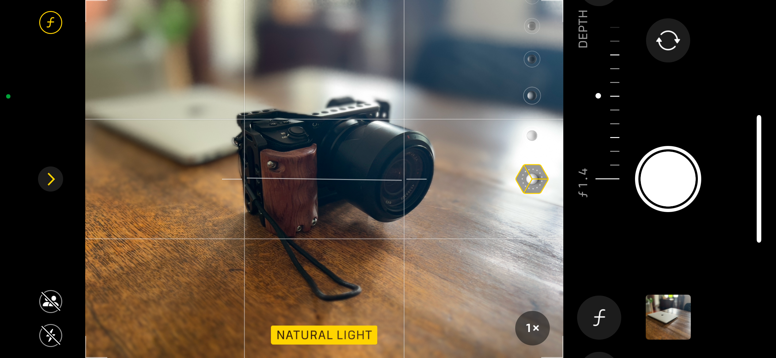 Taking a photo of a camera in Portrait mode.