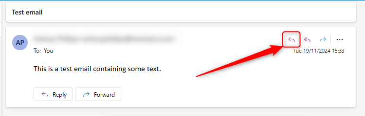 The Reply arrow in the new Outlook.