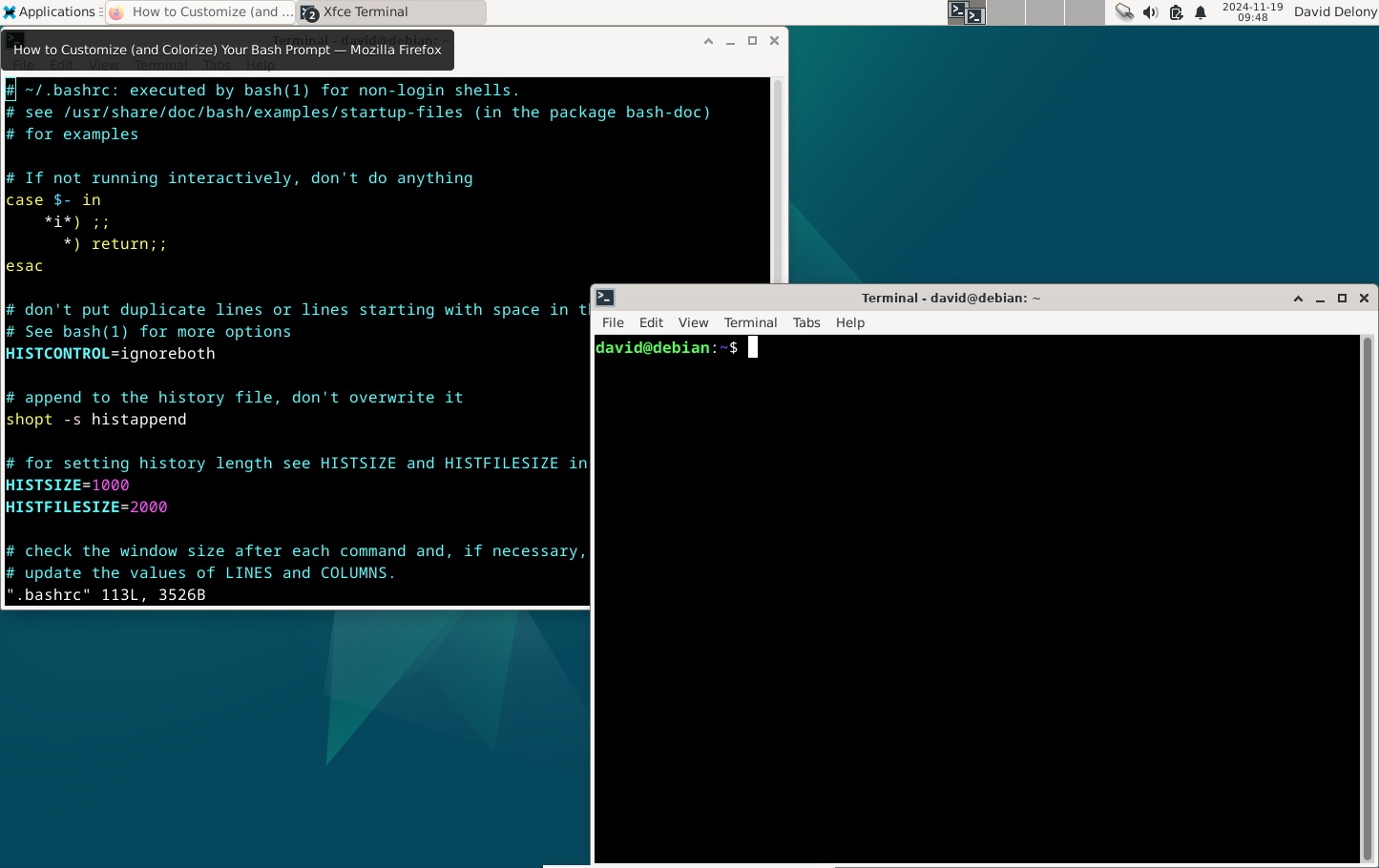 Editing .bashrc in a Vim session in an Xfce terminal window with another terminal window open.