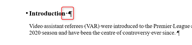 A heading in Microsoft Word, followed by two non-printing 'space' marks.