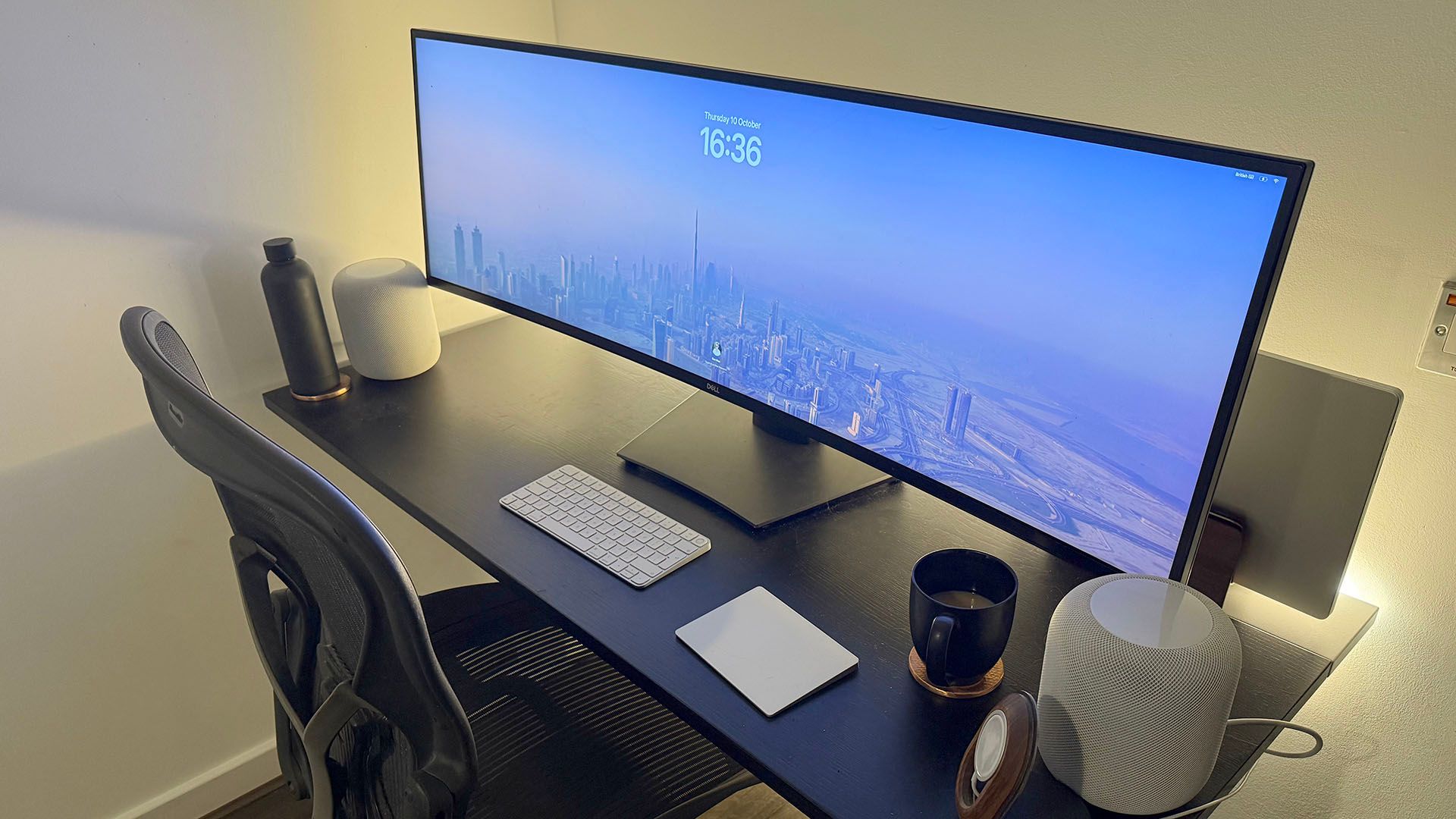 A Philips Hue Light Strip fitted to a desk.