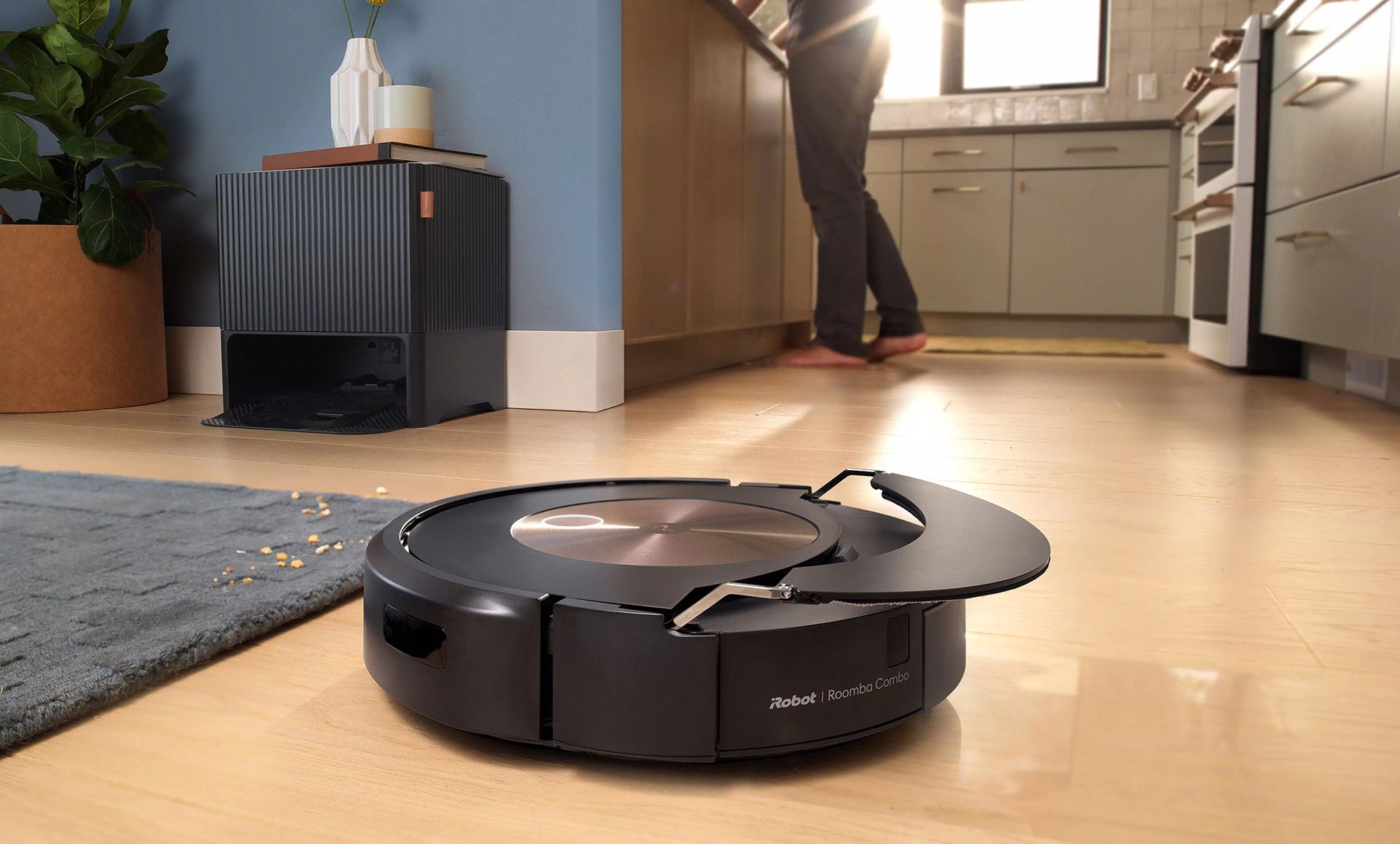 An iRobot vacuum cleaner in use.