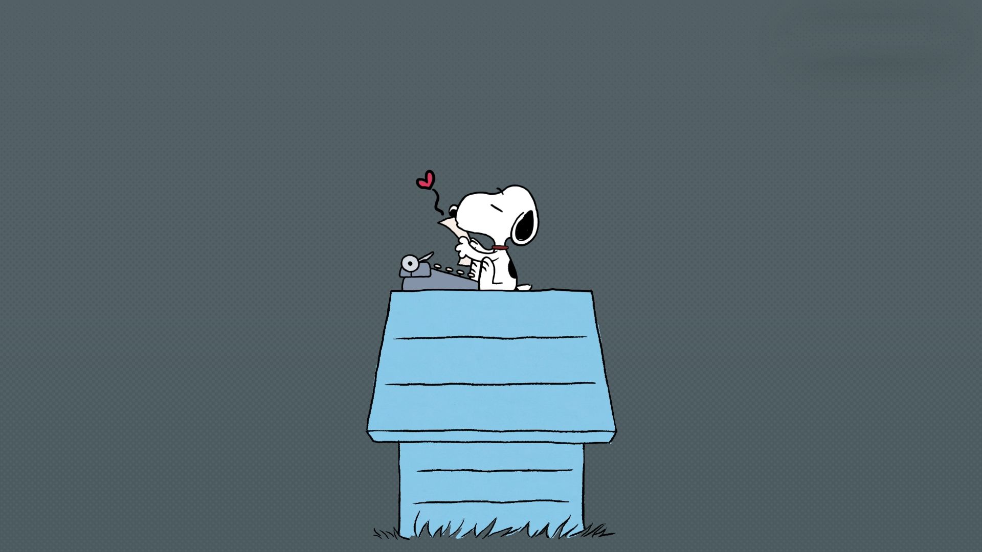 Snoopy sitting on his doghouse.