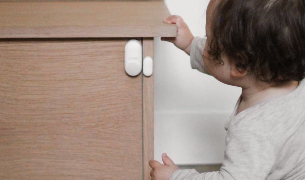 An ecobee contact sensor protecting a cabinet. 