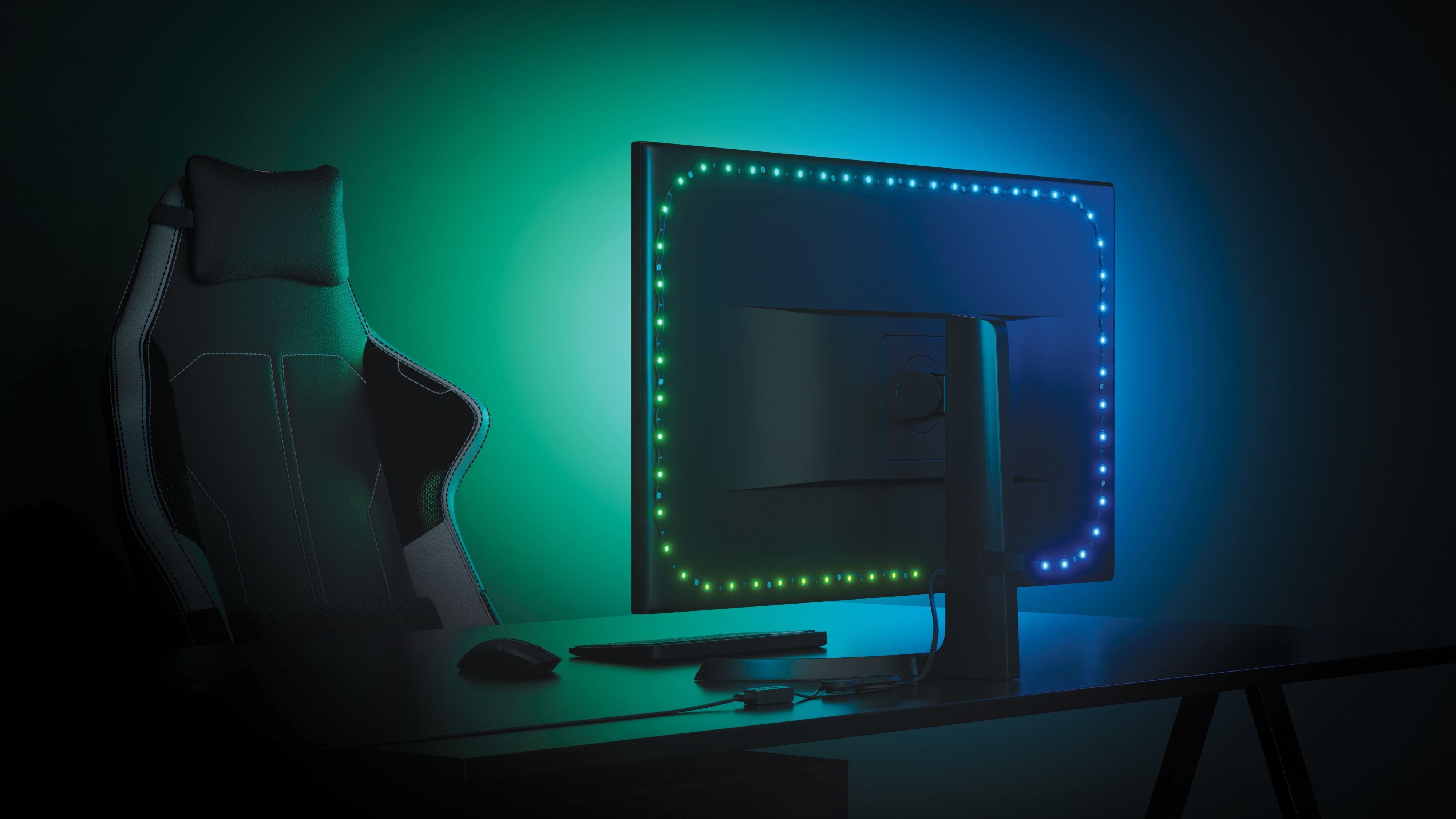 A monitor showcasing Nanoleaf's bias lighting attached to the backside.