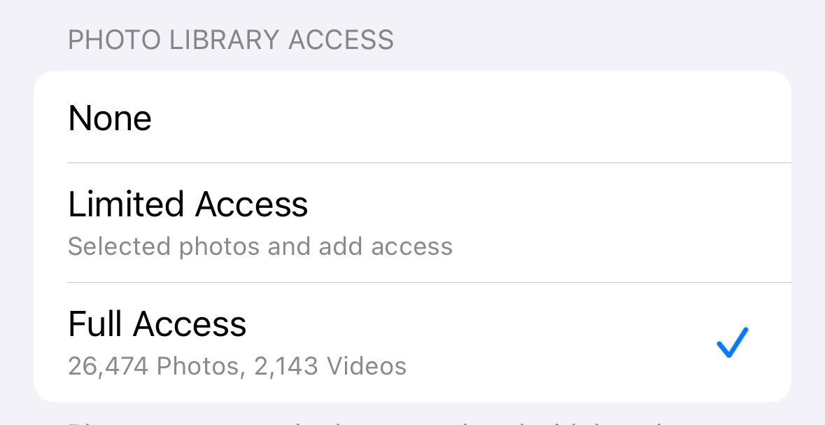 Photos access options in iPhone settings.