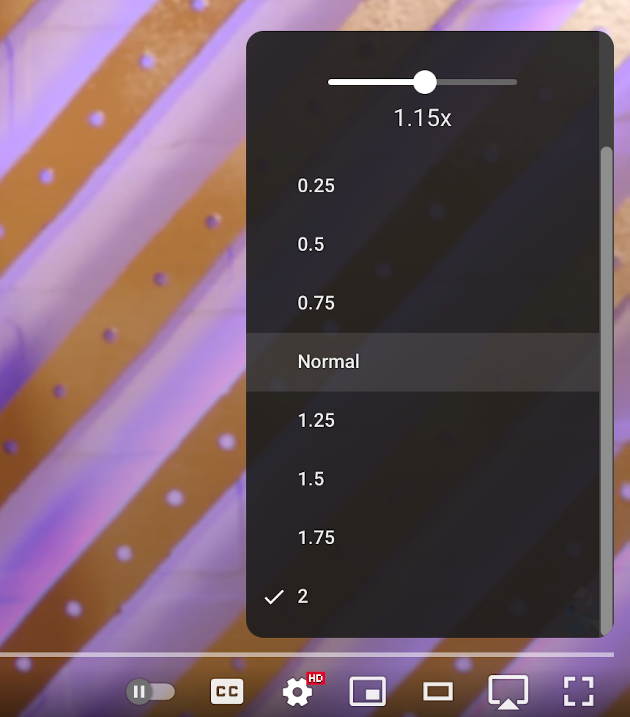 Playback speed slider and menu on YouTube scrolled down to 2x speed.