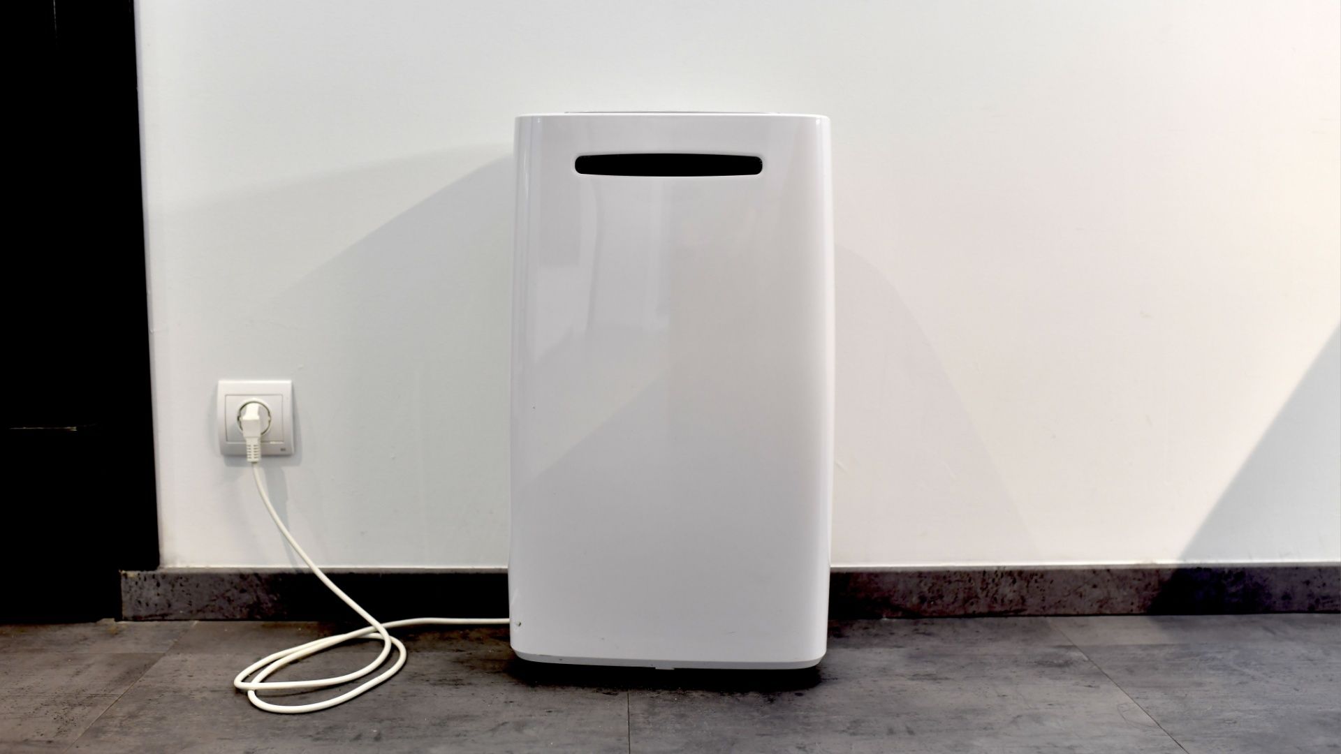 A dehumidifier in the entrance of a house or office. 