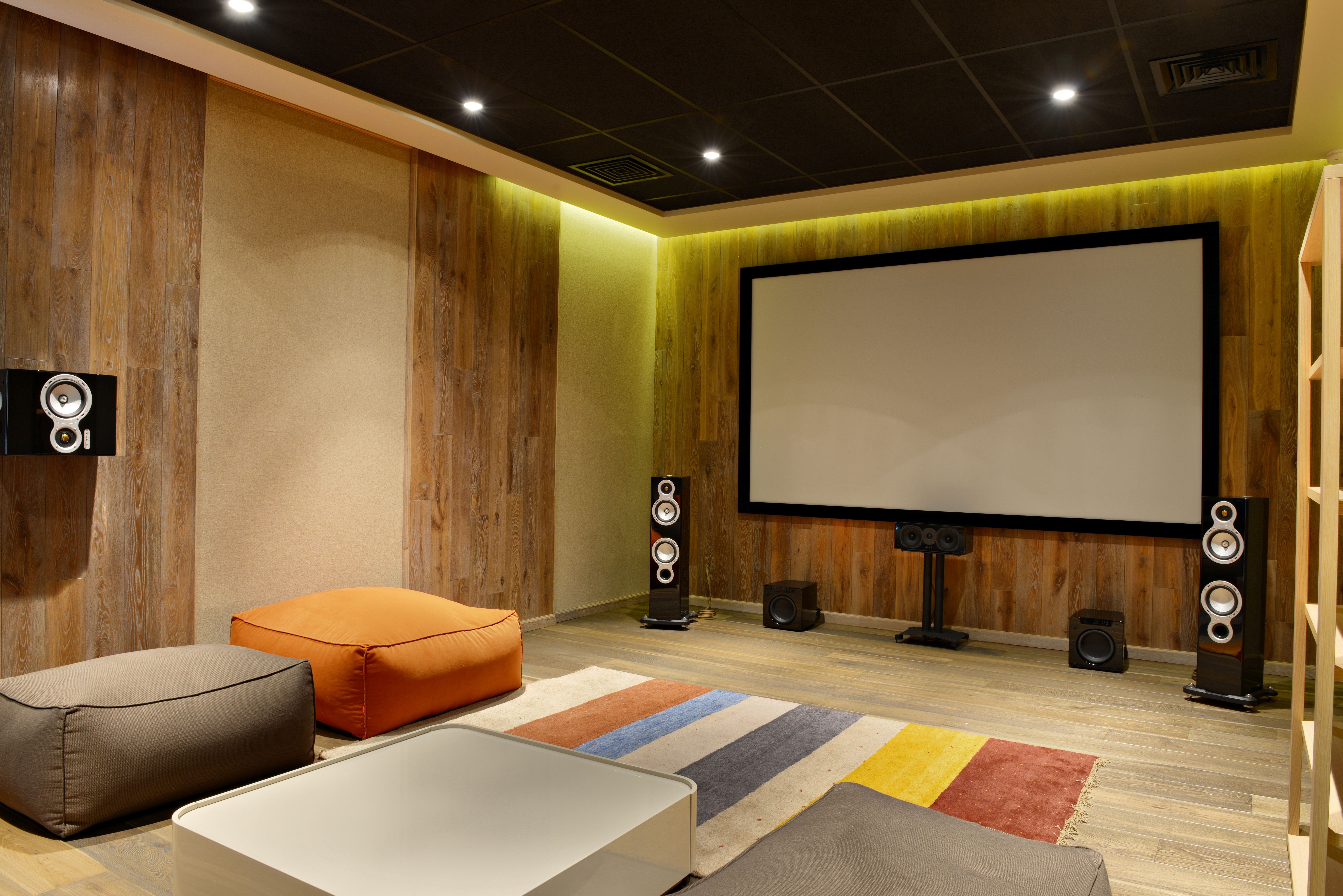 A neat, professional home cinema setup.