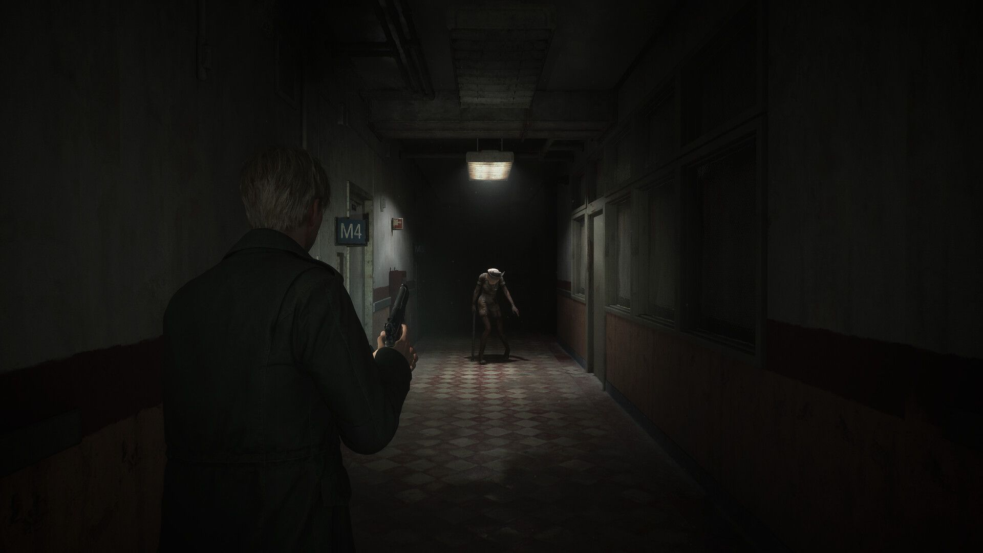 James from Silent Hill 2 holding a gun as a monster approaches.