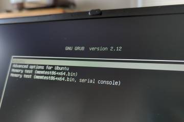 The GRUB2 boot loader on a laptop screen with Ubuntu as an option.