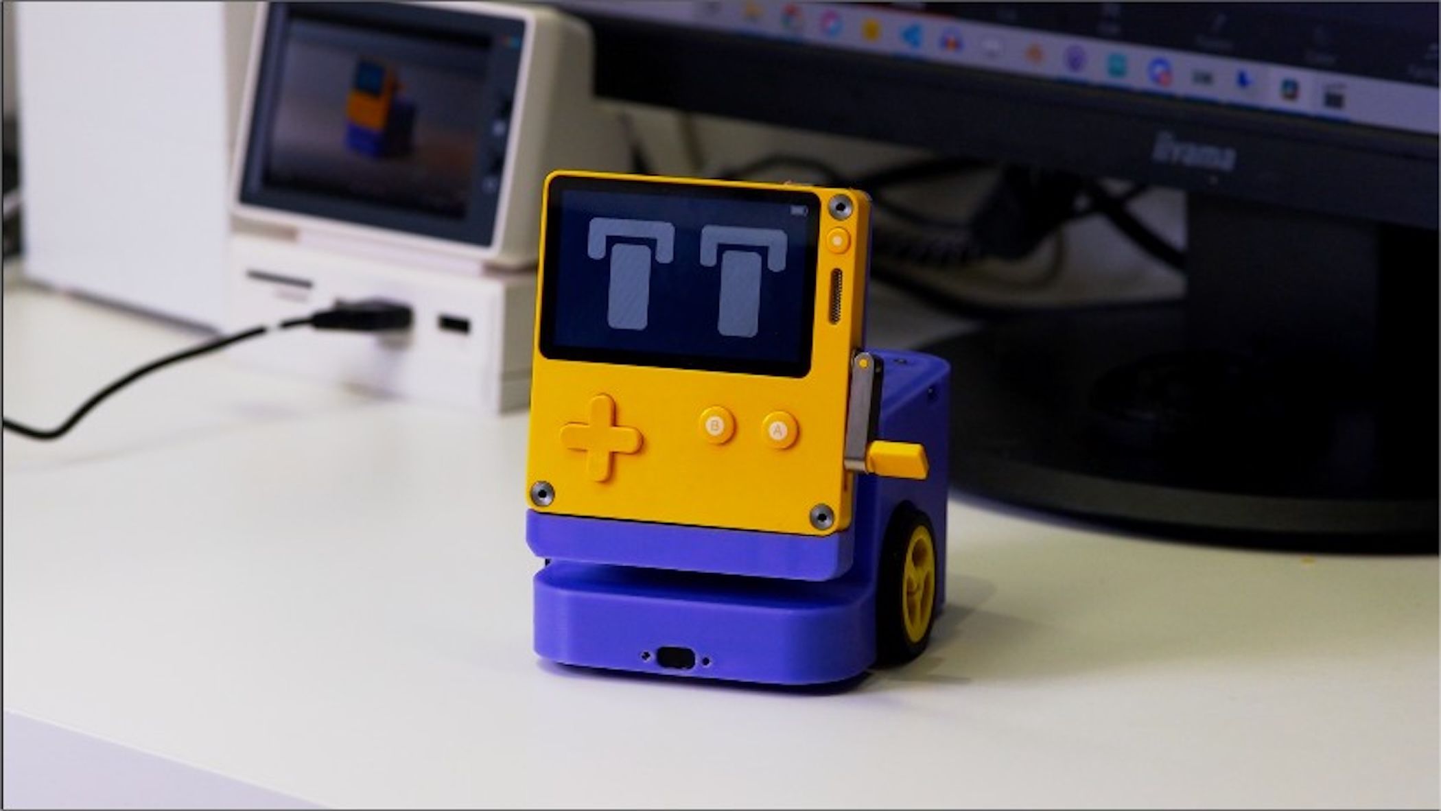 PlayBot dock for the Playdate gaming handheld.