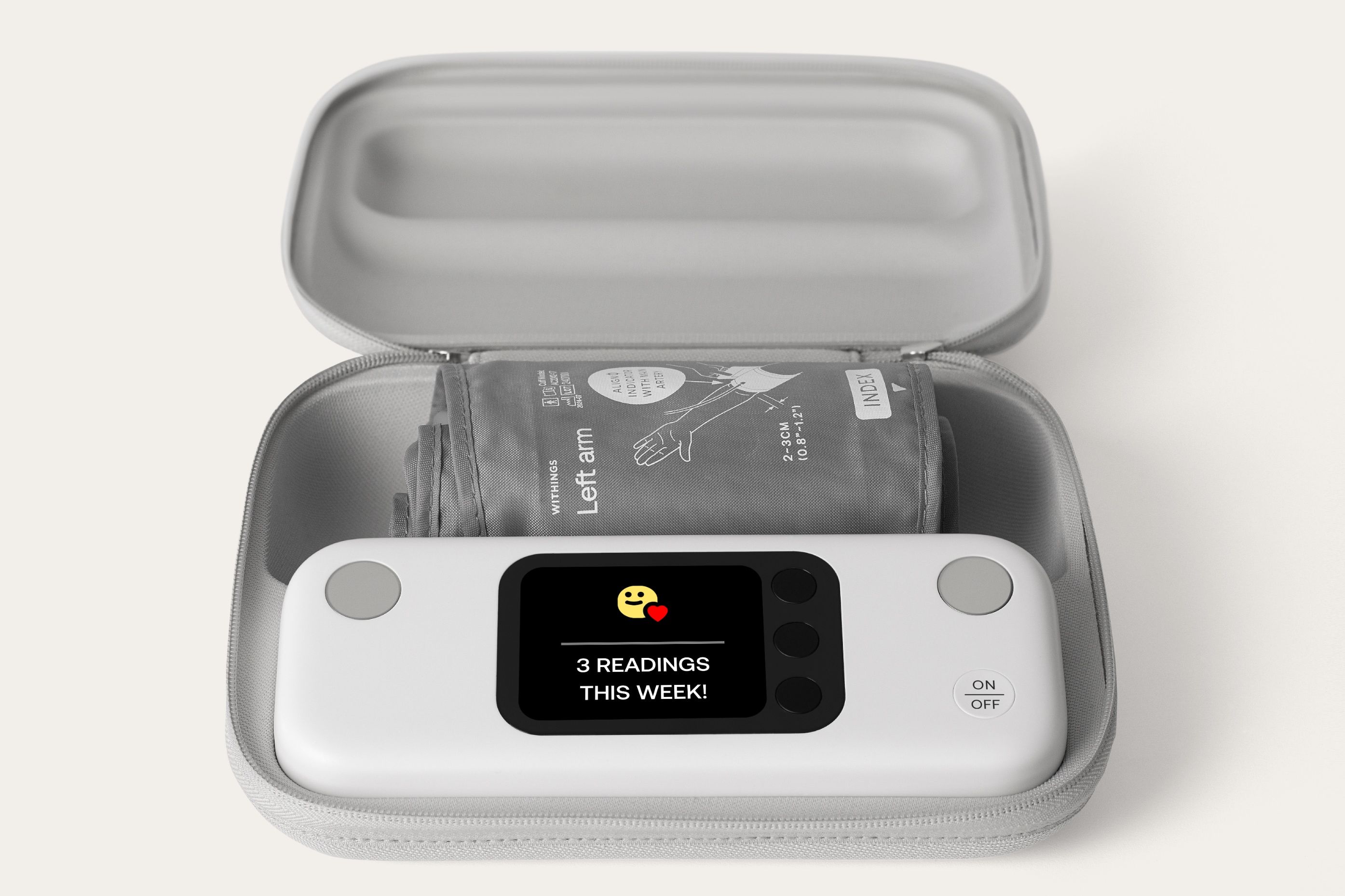 Withings BPM Vision blood pressure monitor displaying the message '3 readings this week' on its built-in screen.