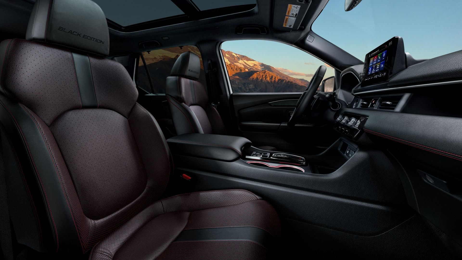 Interior shot of the front row in a 2025 Honda Pilot Black Edition