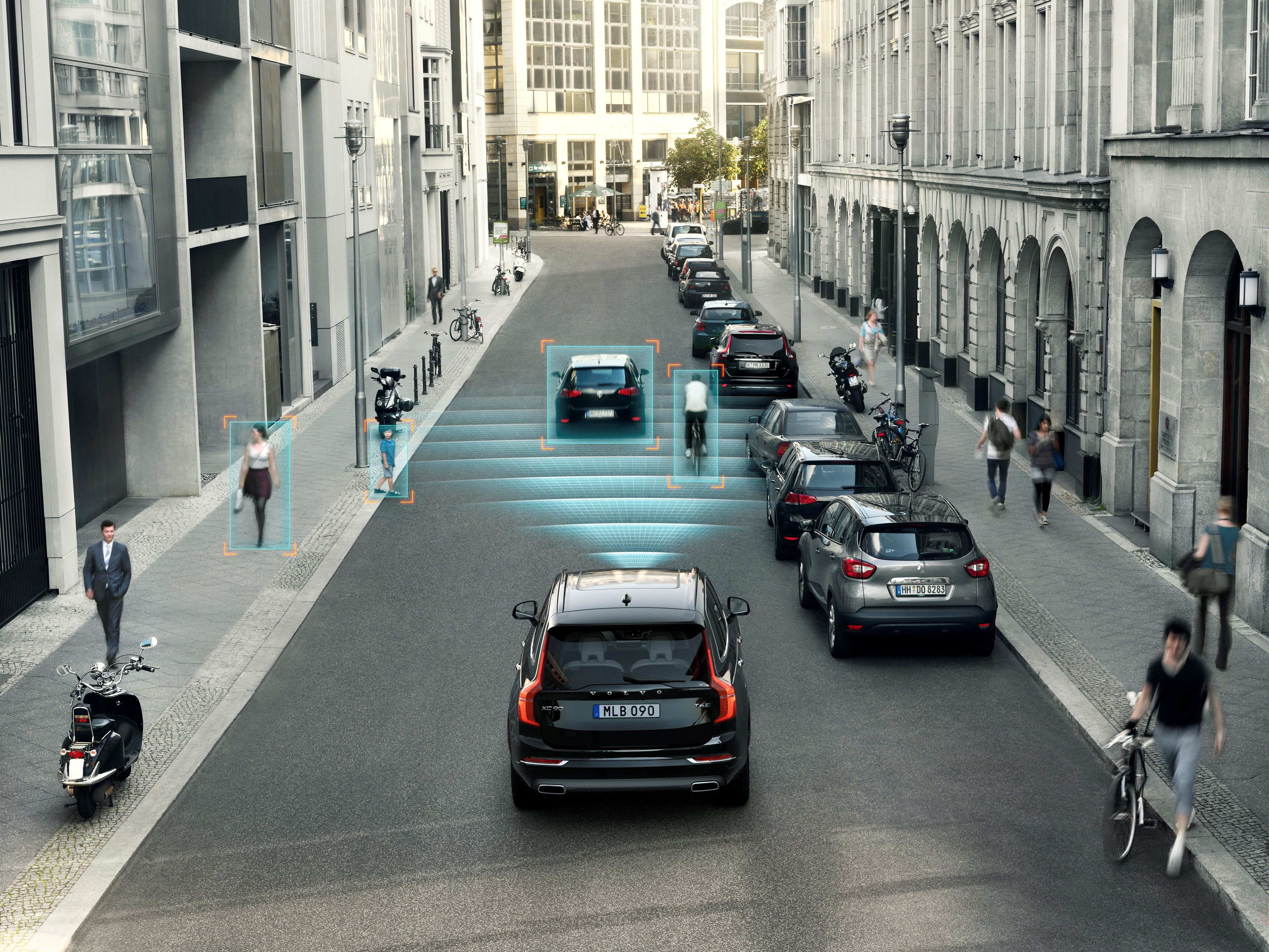 An illustration showing the Volvo XC90's City Safety System scanning cars and cyclists.