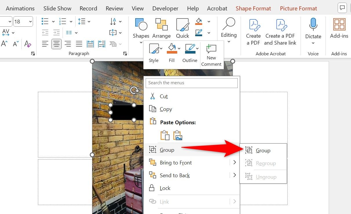 Group > Group highlighted for a shape and a photo in PowerPoint.