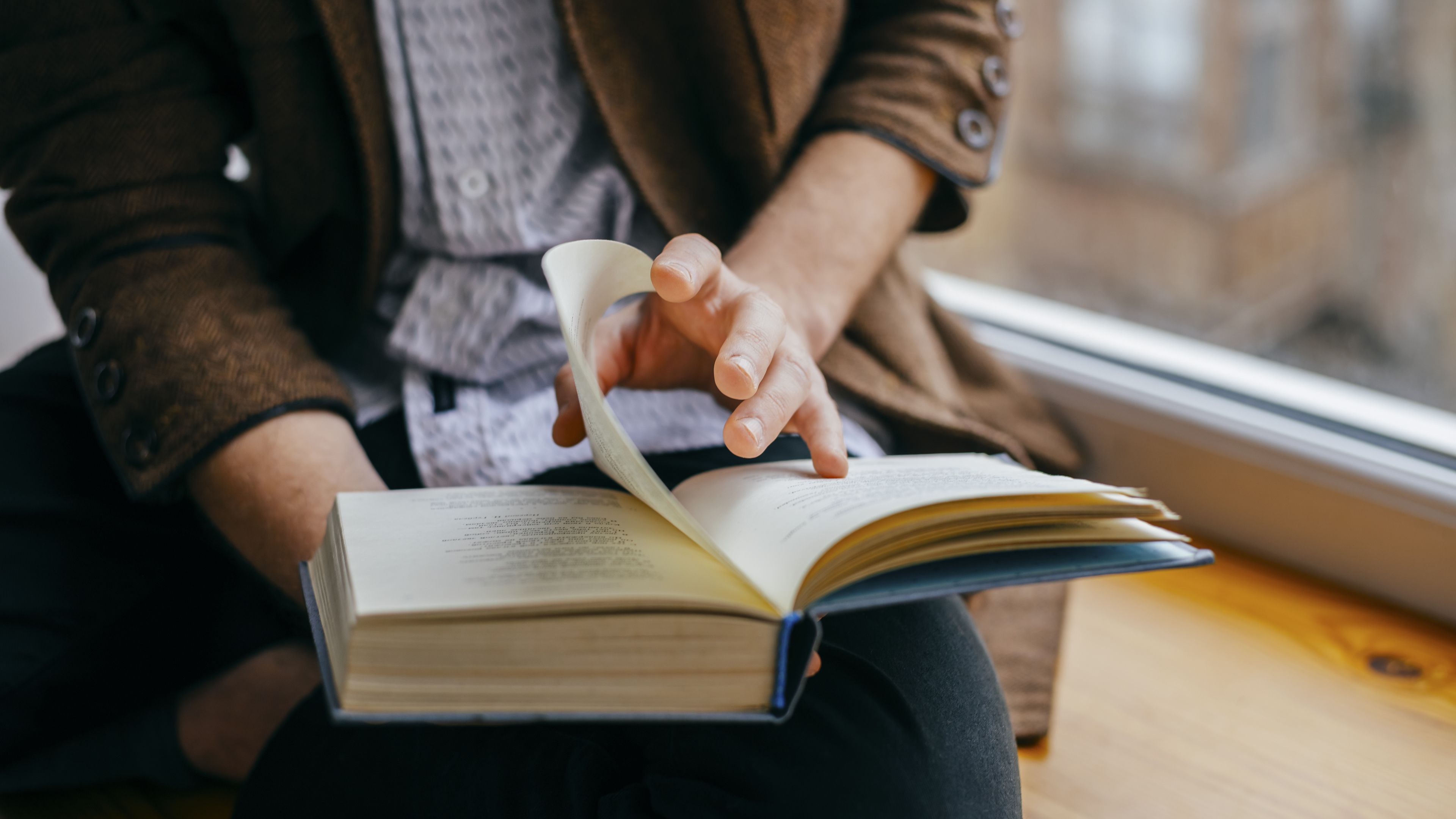 A person reading a book.