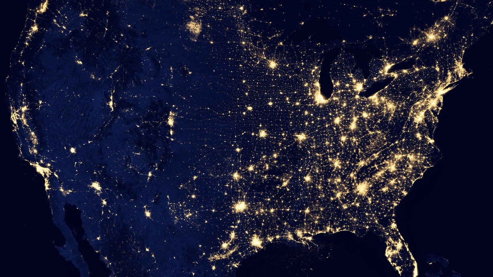 A photograph taken from space of the city lights of the United States.