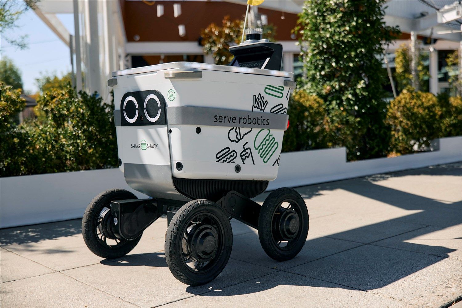 A sidewalk robot from Serve Robotics.