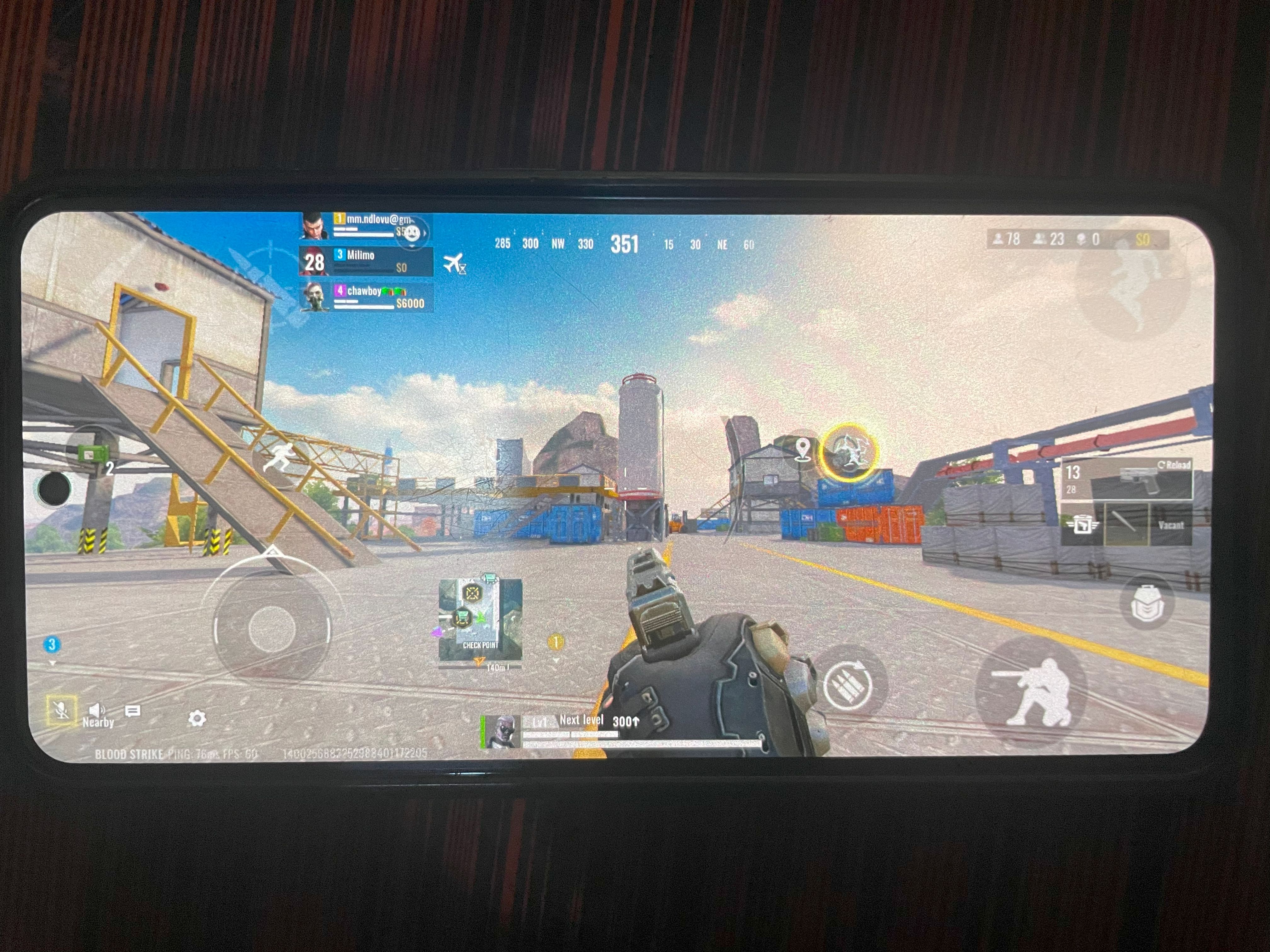 A picture of "Blood Strike" being played on an Android phone.