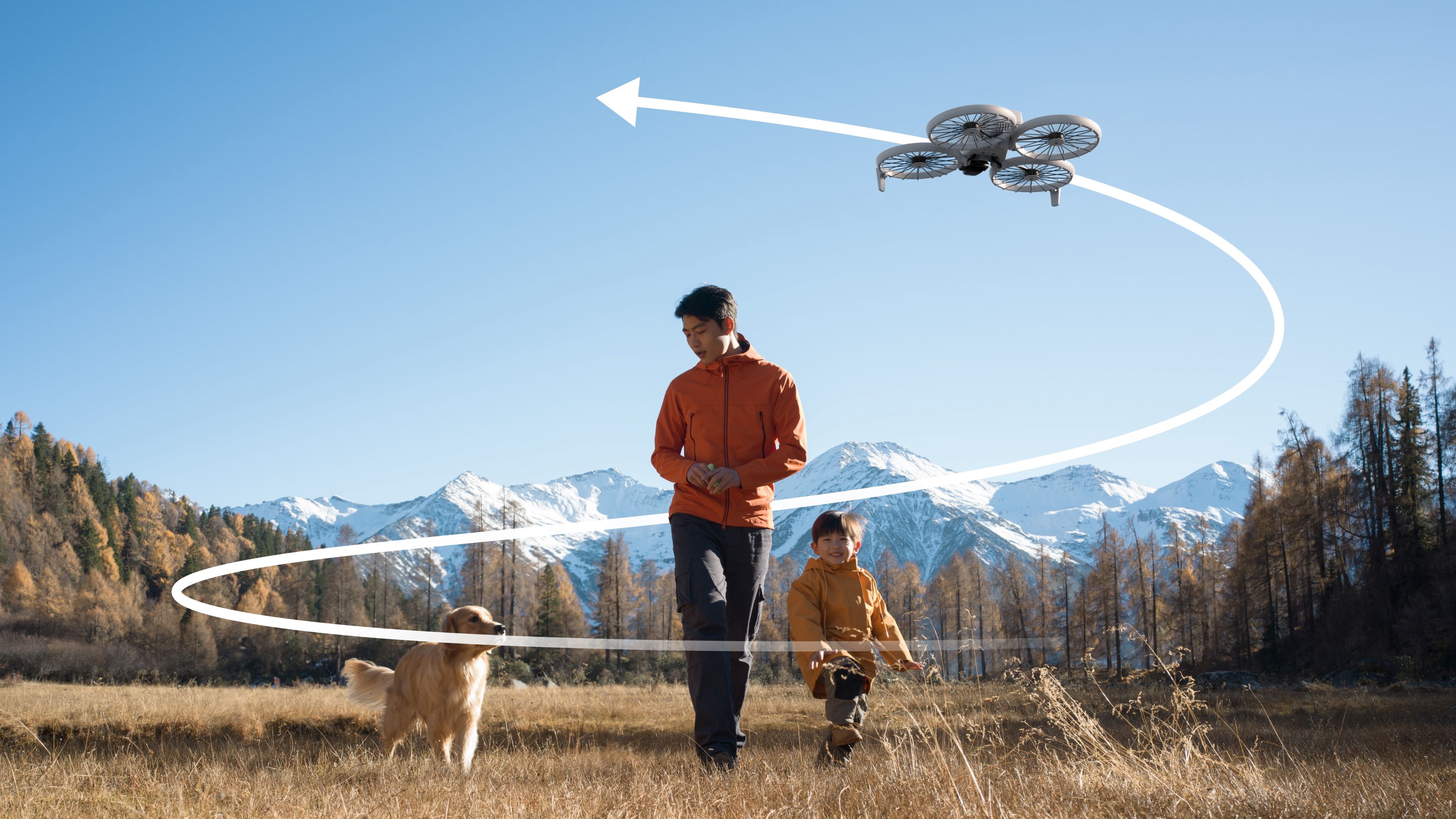 Father operating a DJI Flip drone outdoors, with his son and dog walking next to him.