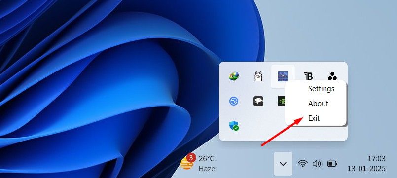 Exit option in the system tray area.