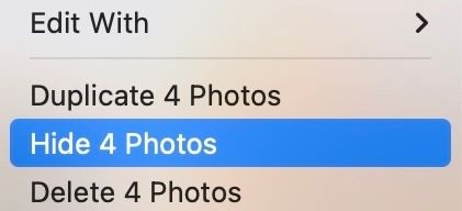 Hide option in context menu to hide selected photos in Mac Photos app.