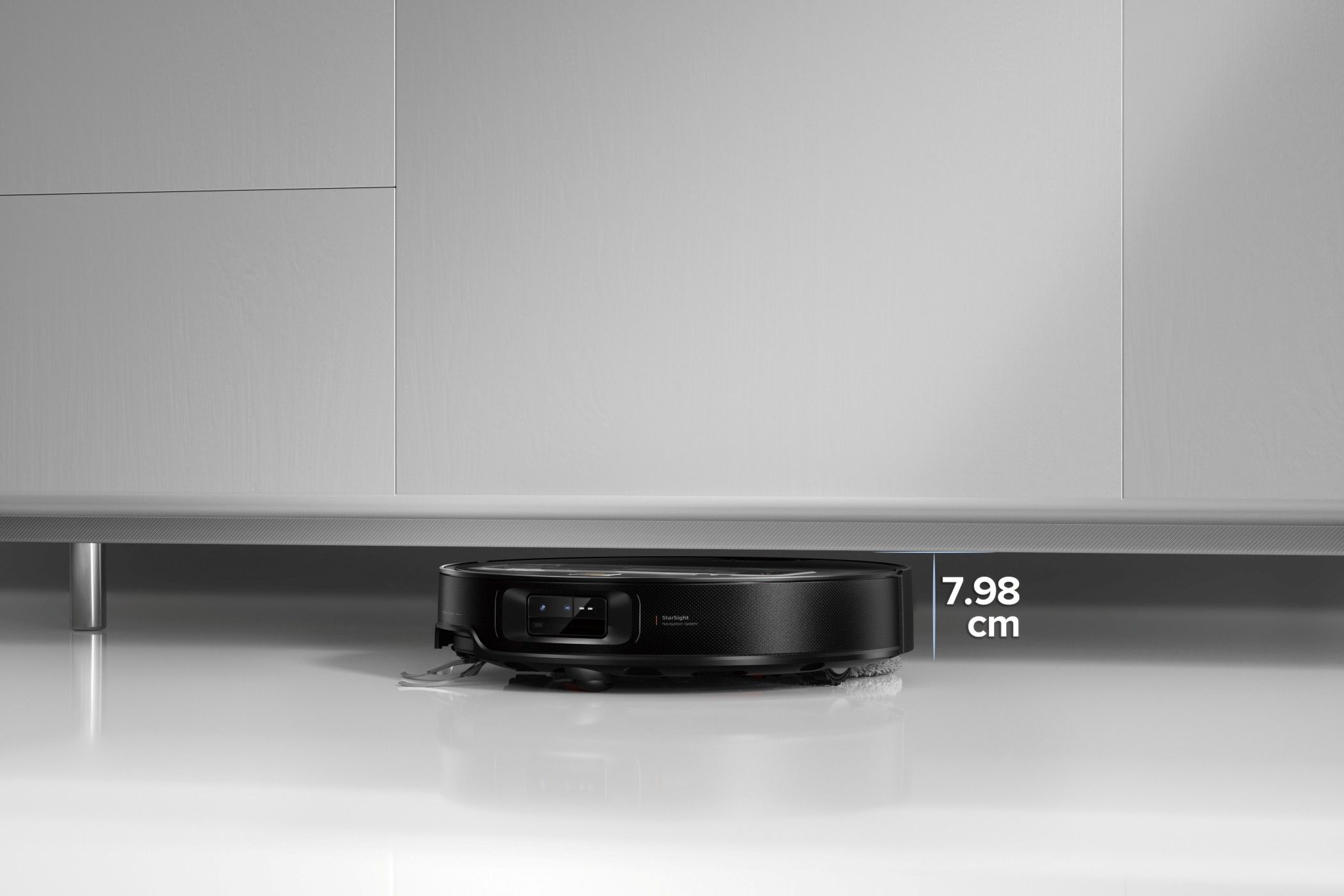 Ultra-Slim Roborock Saros Z70 Cleaning Under a Cupboard