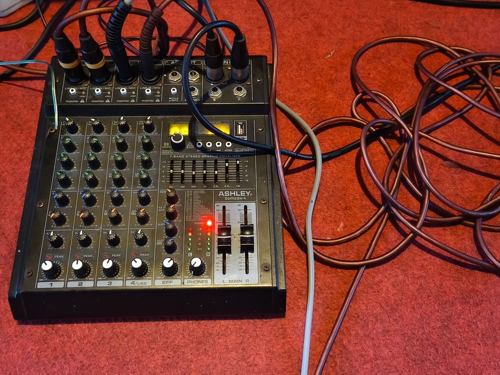 A small, portable mixing desk.