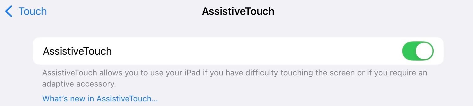 AssistiveTouch toggled on in iPadOS Settings app.