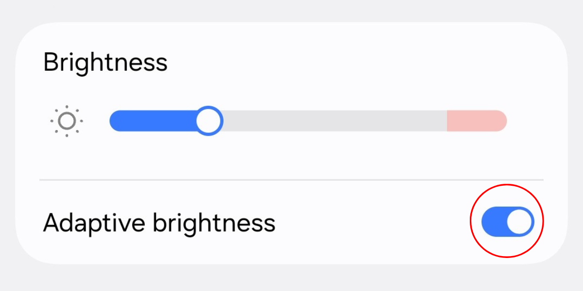 Screenshot of the Display settings menu highlighting the Adaptive brightness option on the Galaxy S25.