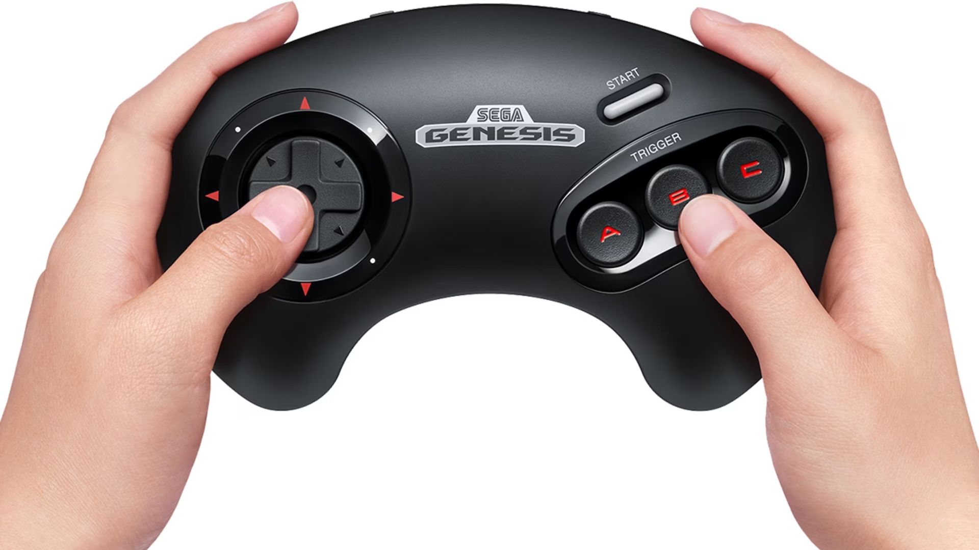 Hands holding a Nintendo Switch Online SEGA Genesis controller.