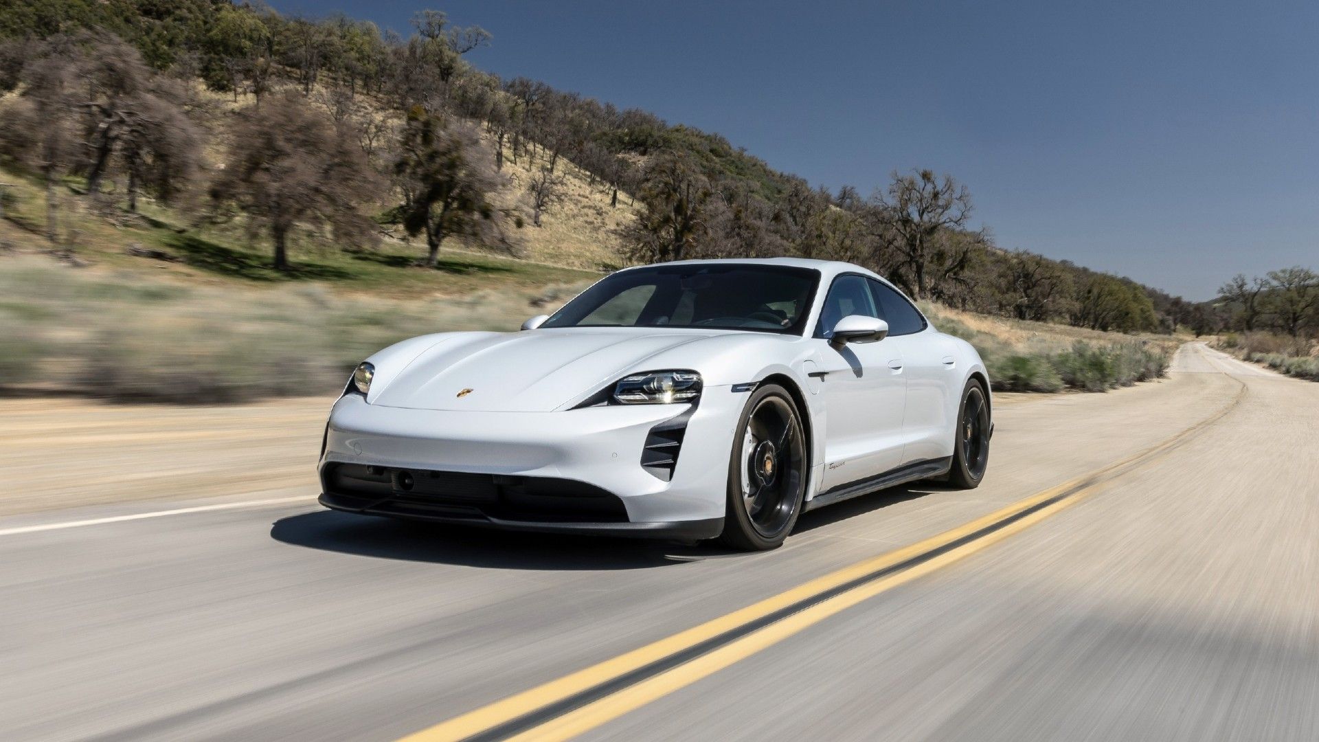 2023 Porsche Taycan front quarter driving