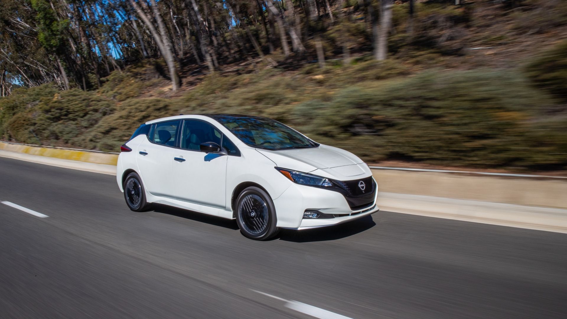 Front quarter view of the 2024 Nissan Leaf driving