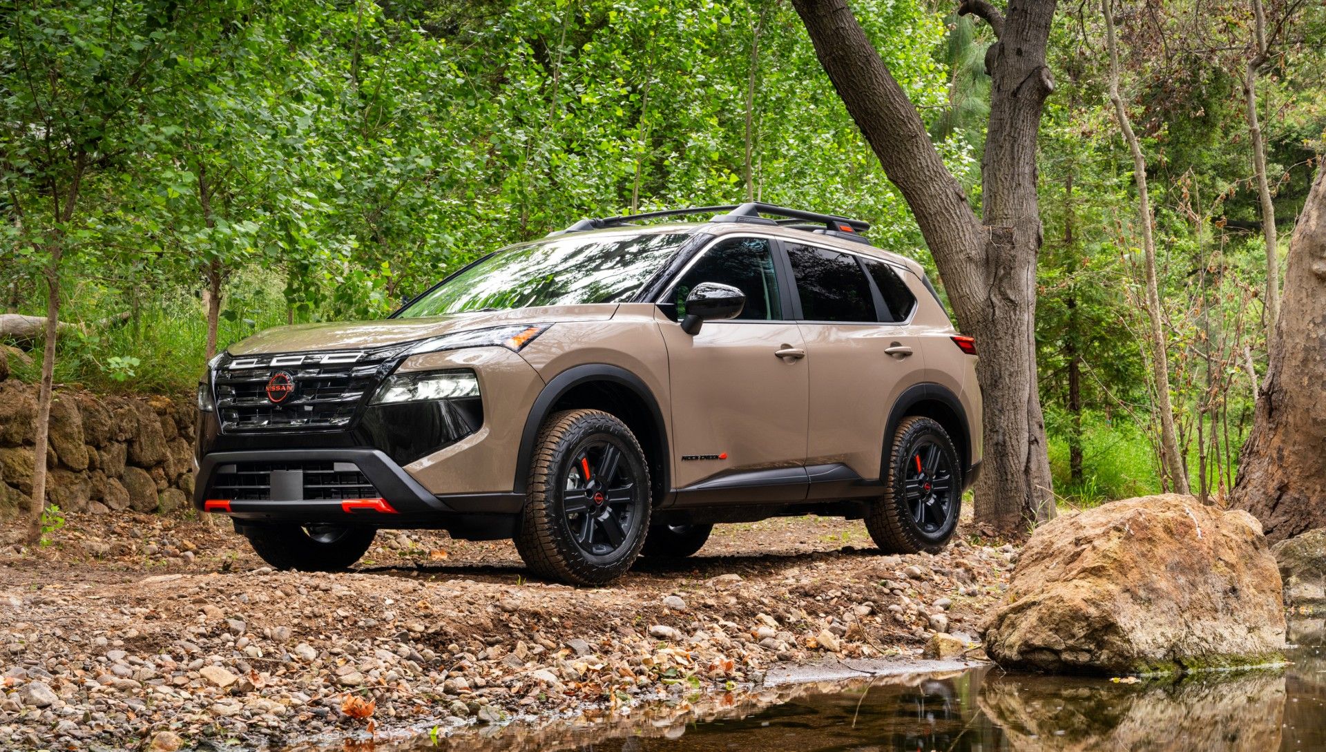 2024 Nissan Rogue parked in forest