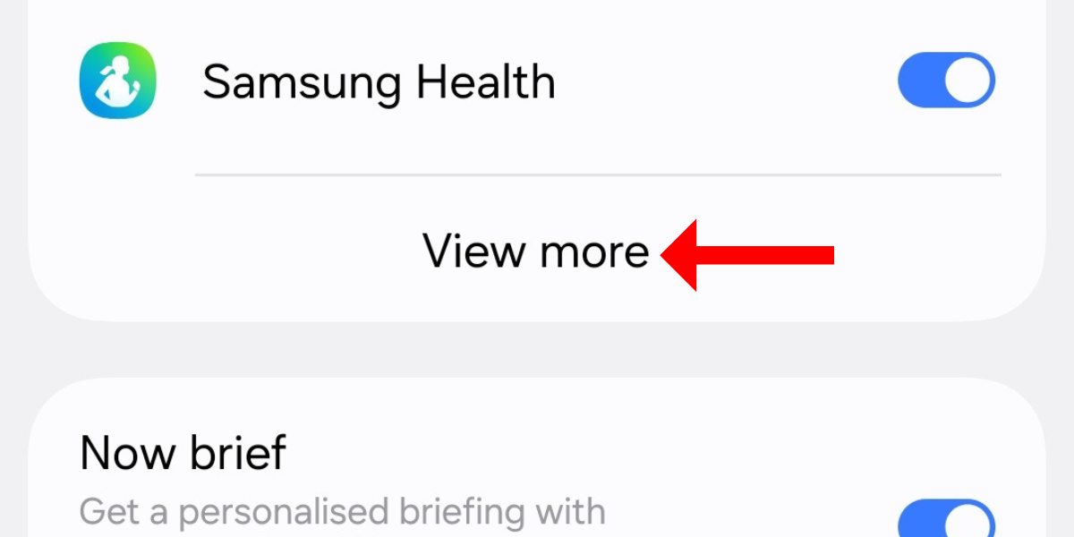 Screenshot of the Now Bar settings menu with an arrow next to the View more option on the Galaxy S25.