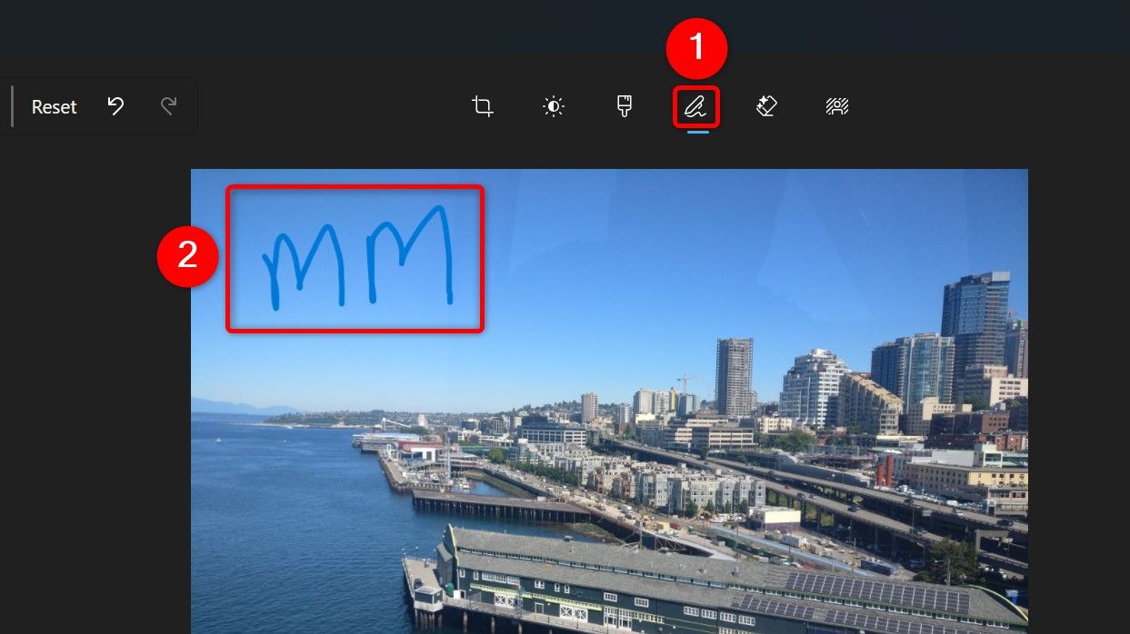 The "Mark-up" tool and a drawing-based watermark highlighted in Photos.