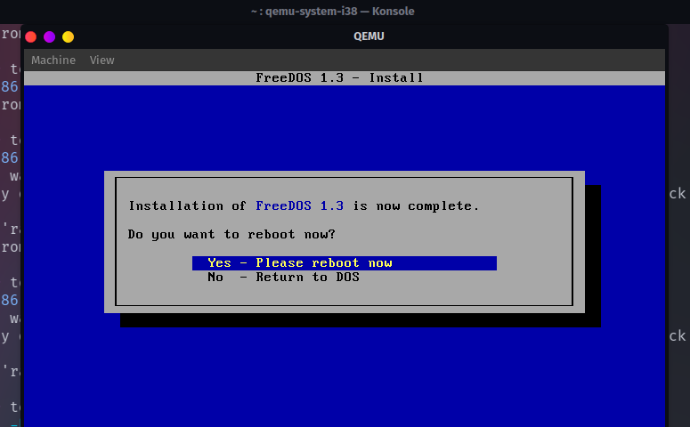 A FreeDOS installation in QEMU completion screen.