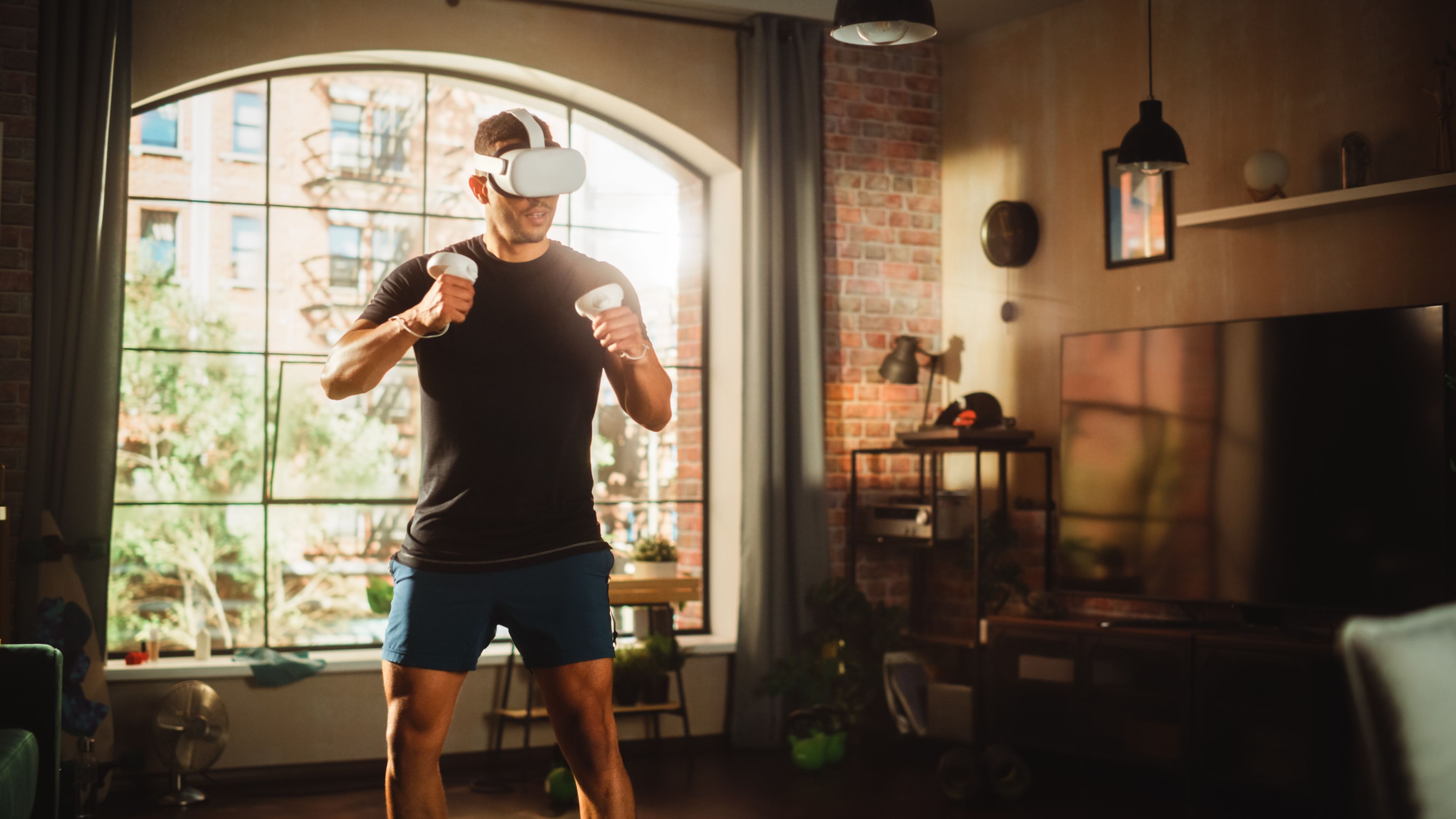 A man using a VR headset for fitness gaming.