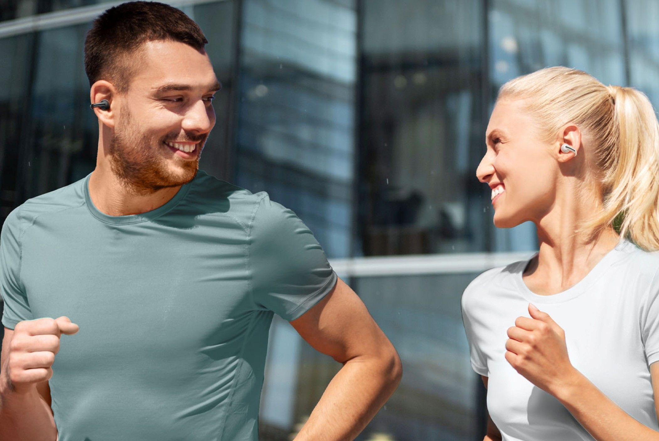 A Couple Jogging While Wearing Bowie MC1 Earbuds