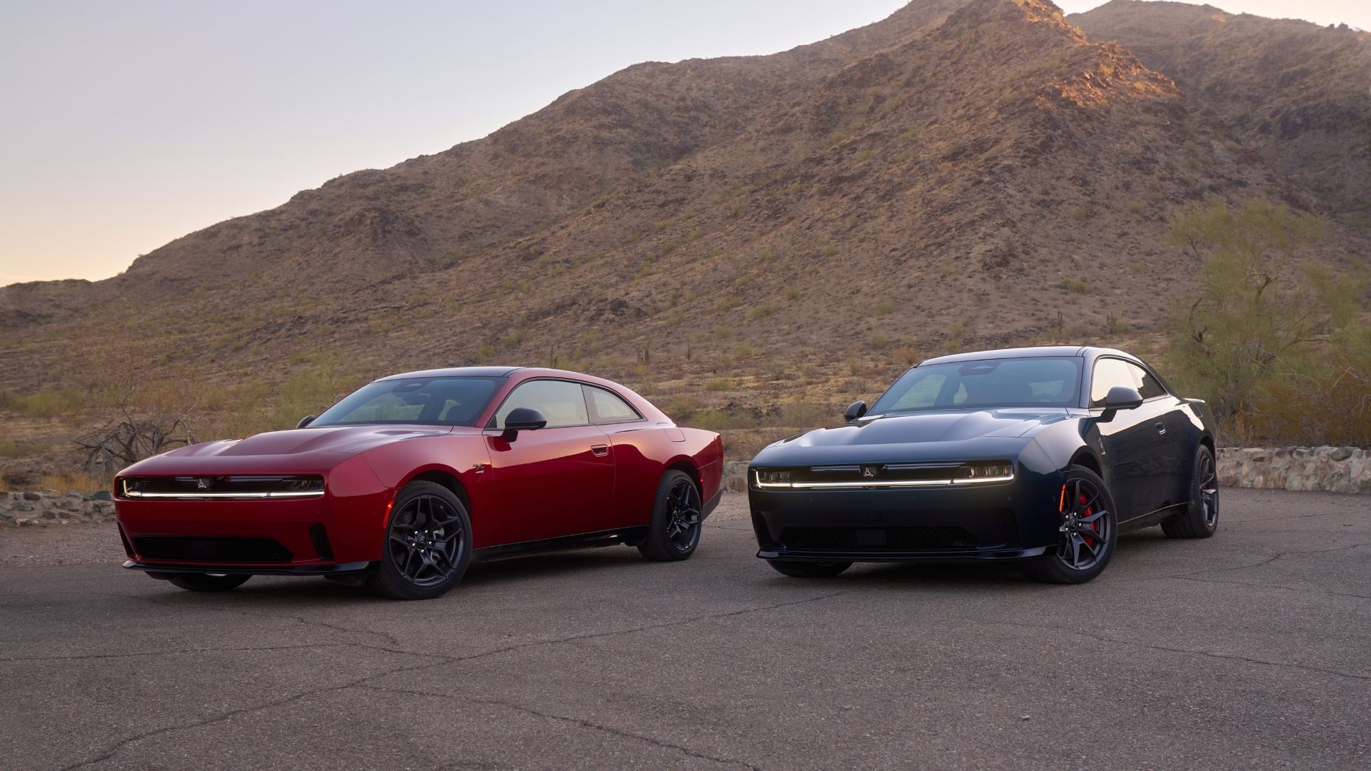 A 2025 Dodge Charger Scat Pack (Right) and 2025 Charger R/T Daytona (Left)