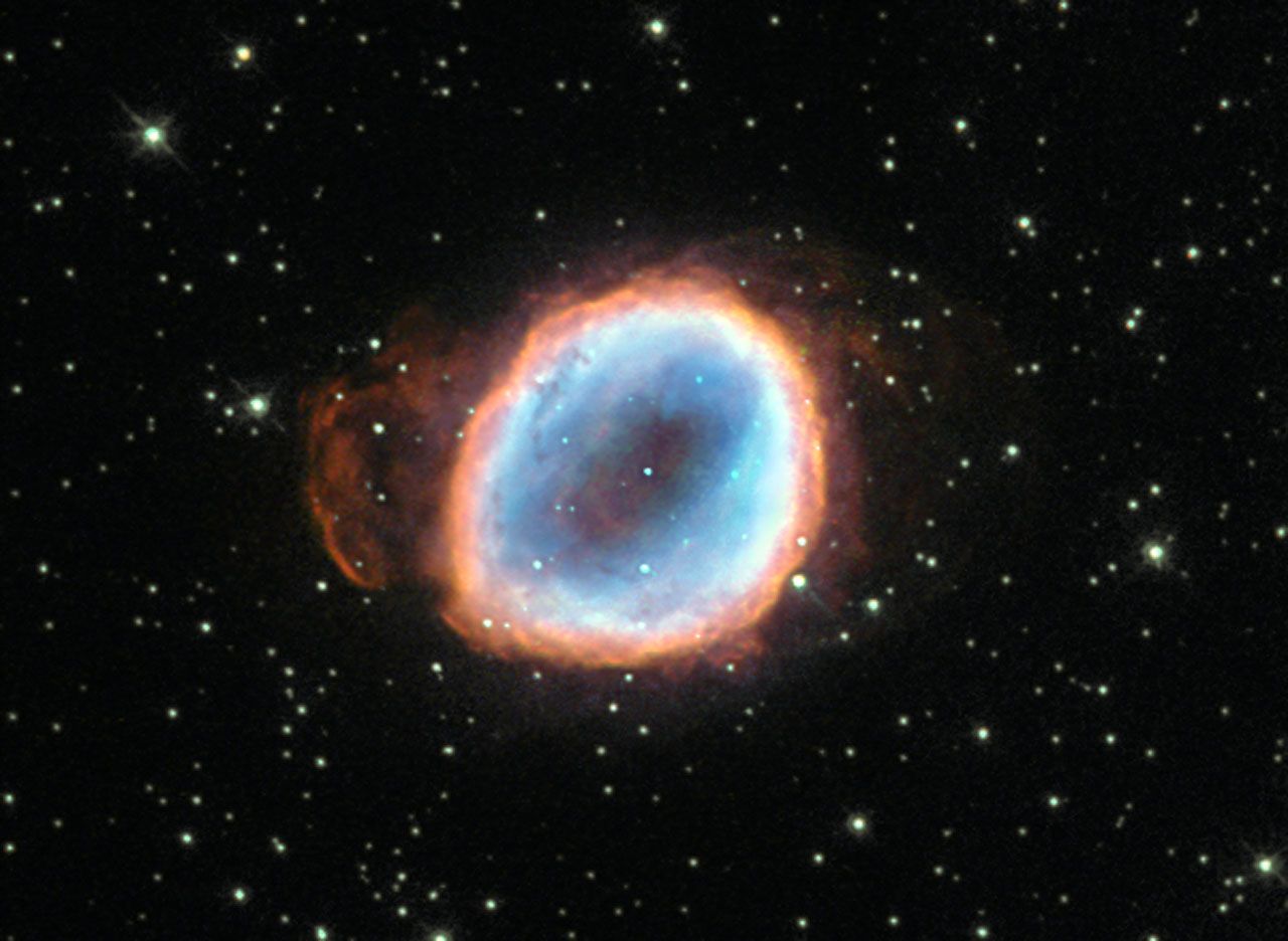 A dying star and a cloud of gas surrounding it.