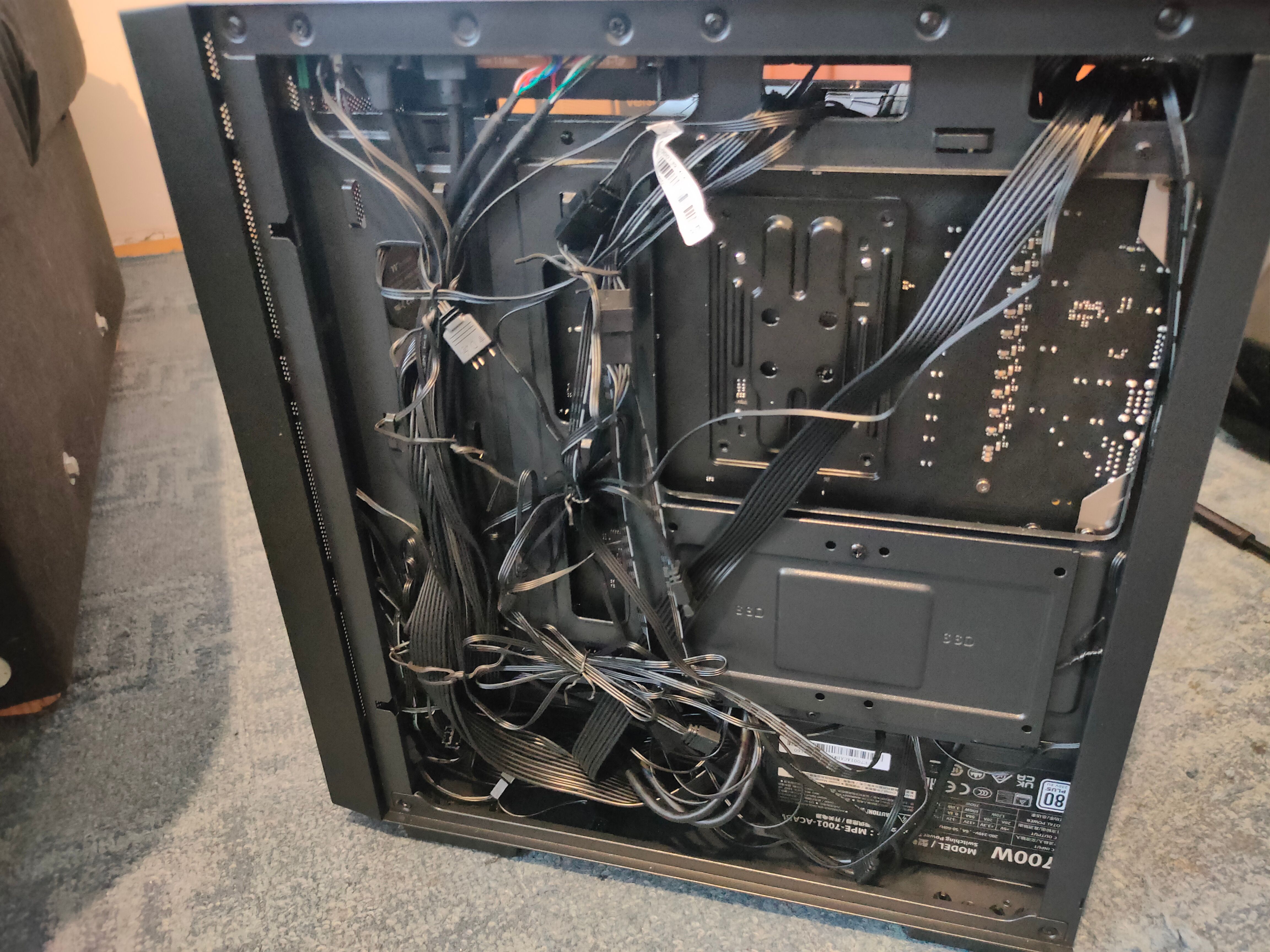 The cables in the back of a computer.