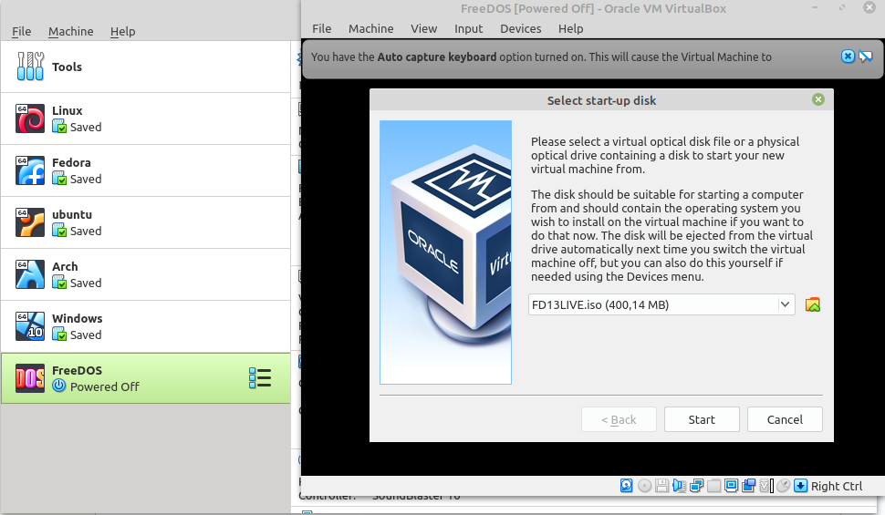 Selecting the FreeDOS CD image in VirtualBox.