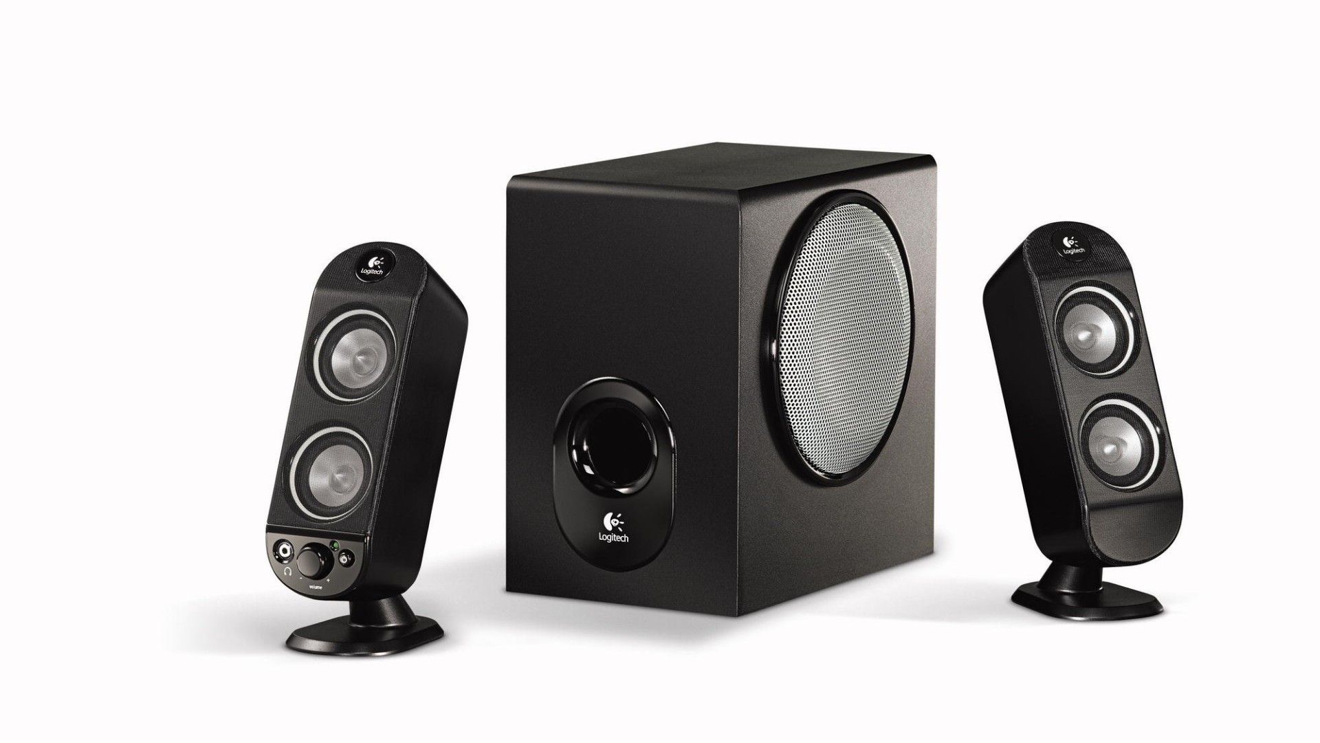 A set of Logitech X230 2.1 speakers. 