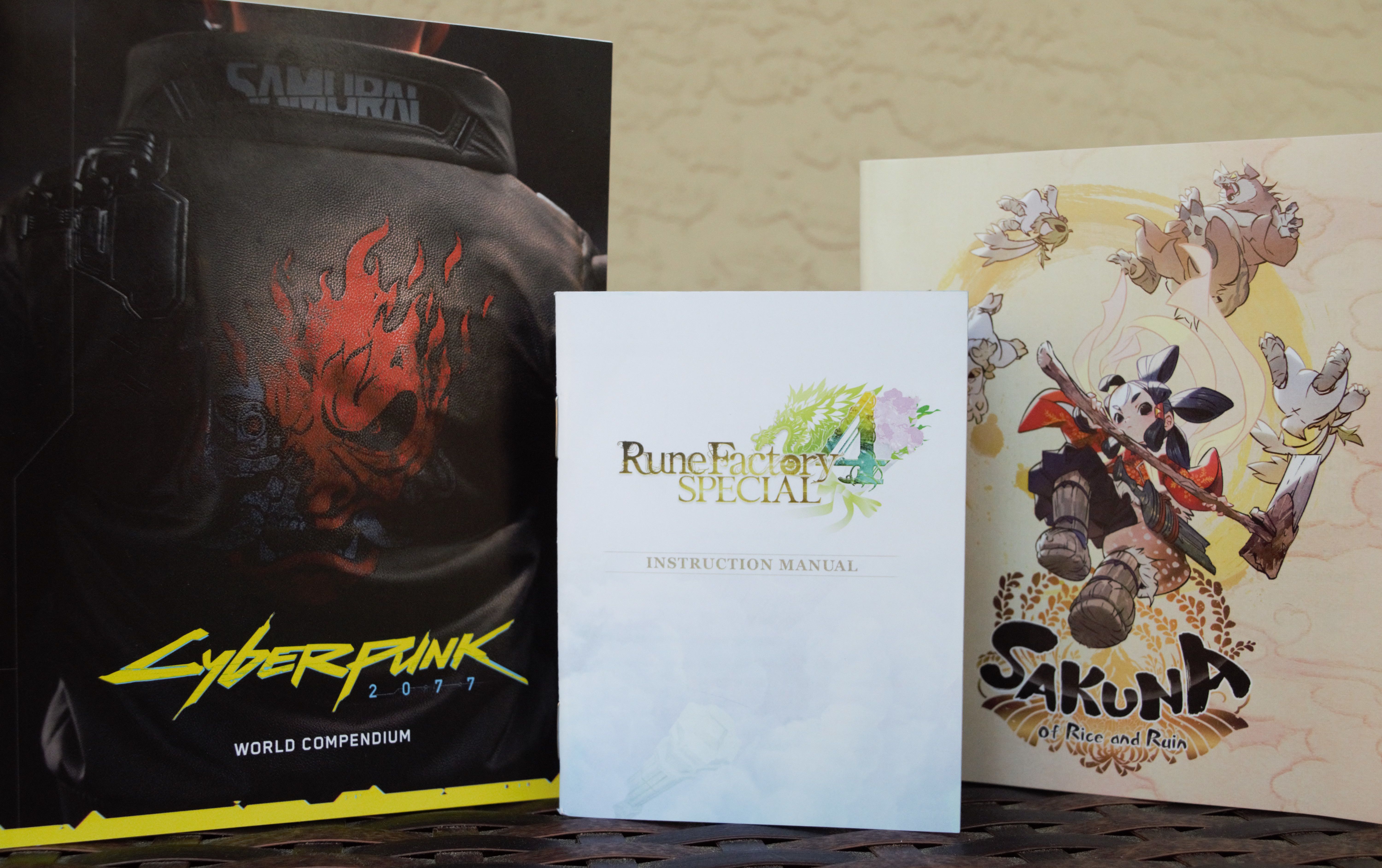 Instruction Manuals/Compendiums for Cyberpunk 2077, Rune Factory 4 Special, and Sakuna: Of Rice and Ruin.