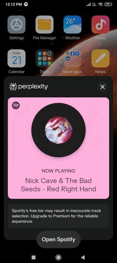 Preplexity playing song on Spotify.